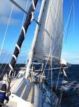 racing south in big seas