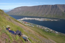 Gary relaxes on a hillside above Isafjordur