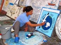 painting our logo on the wall